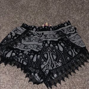 Size small black and white patterned shorts